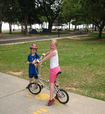 Giirl learning to ride (Jz88 in East Coast Park Singapore)